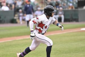 Revs Back in Tie for First After Rain Shortened Loss