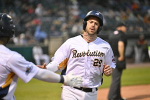 Scott’s Strong Return and Lewis’ Five RBI Help Revs Increase Winning Streak to Five