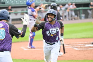 Revs Drop Rubber Match to Hot Hitting Hawks