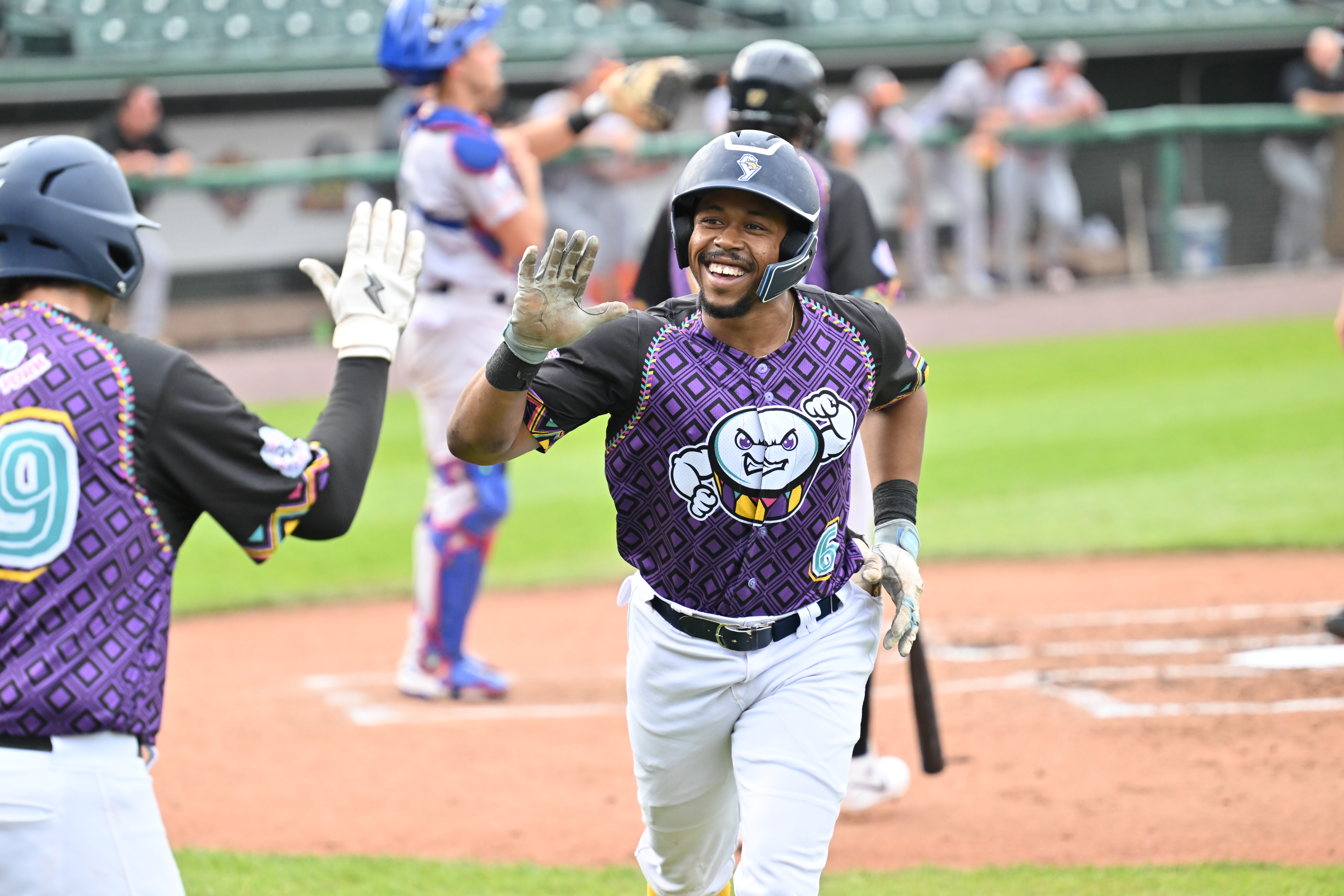 Revs Drop Rubber Match to Hot Hitting Hawks