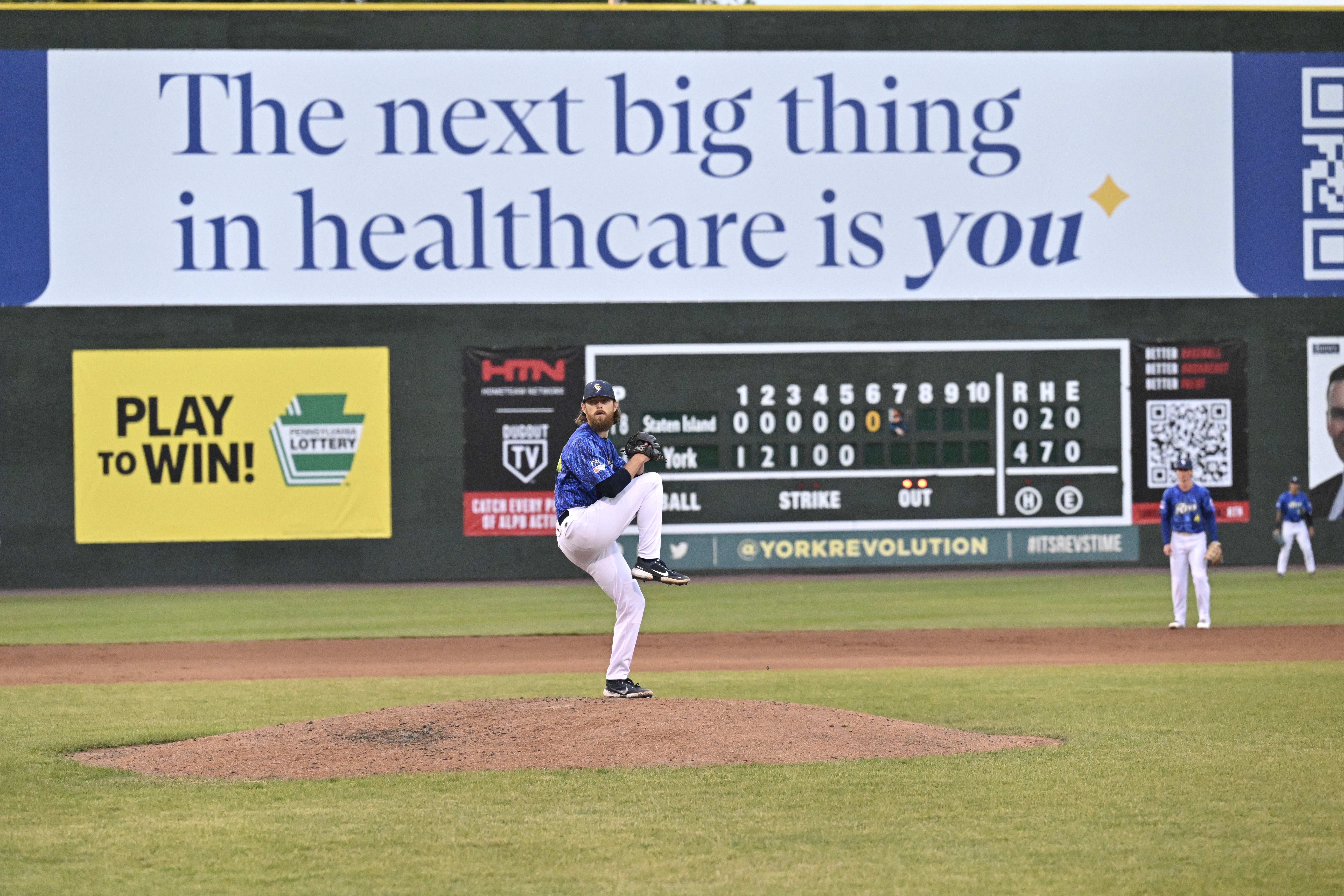 Scott Dominates as Revs Win Late for Fifth Straight Victory
